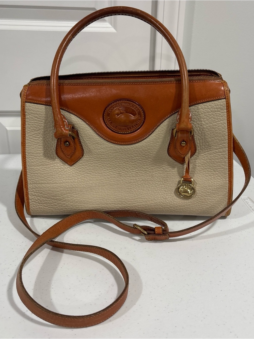 Vintage All weather Leather Two-Tone Satchel Bag in Beige and Tan with gold duck